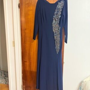 Xscape midnight blue lace long sleeve dress. NWOT Size 12